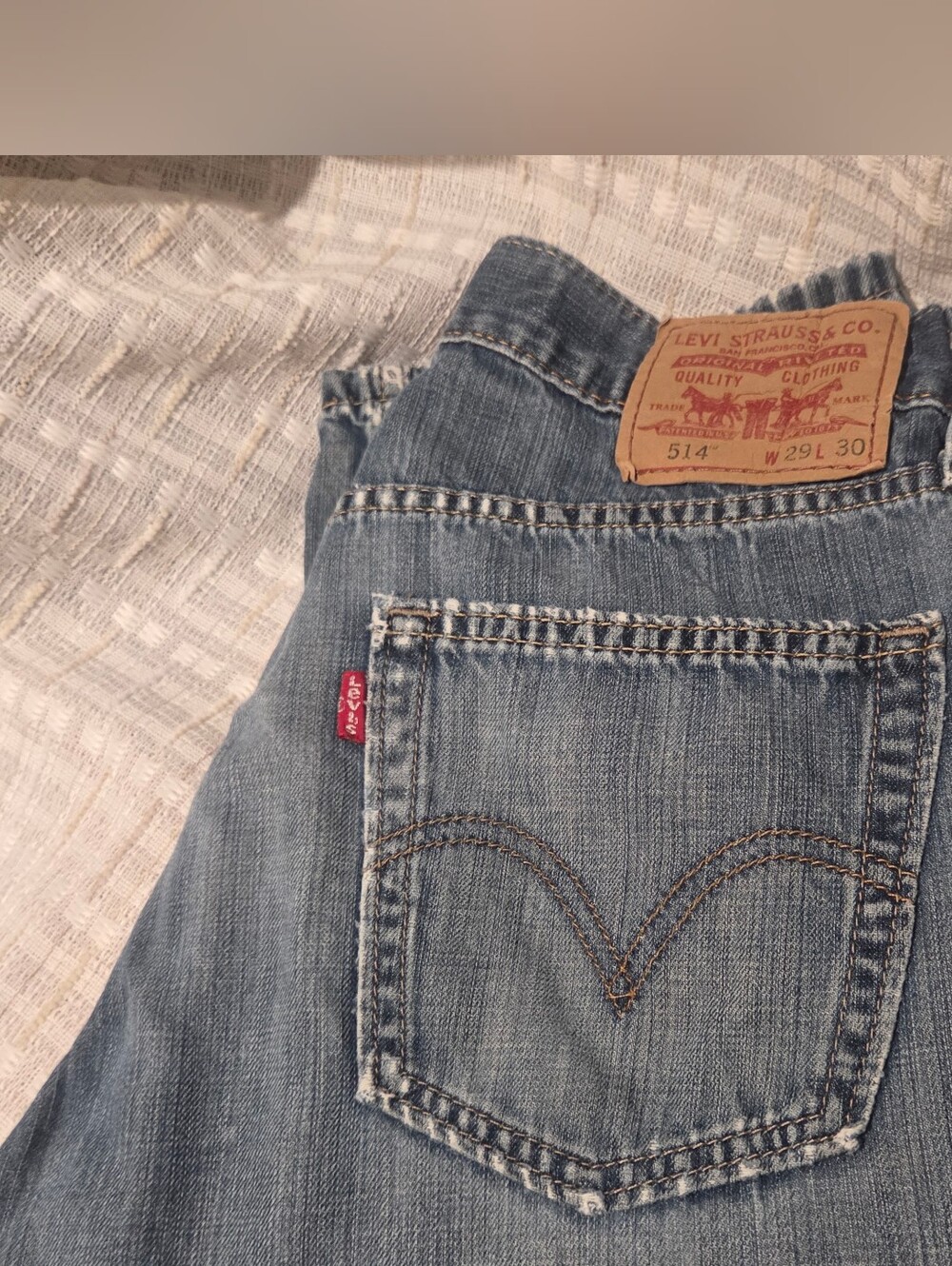 Levi's slim straight jeans in light wash denim. W29 X L30 See All Pictures.
